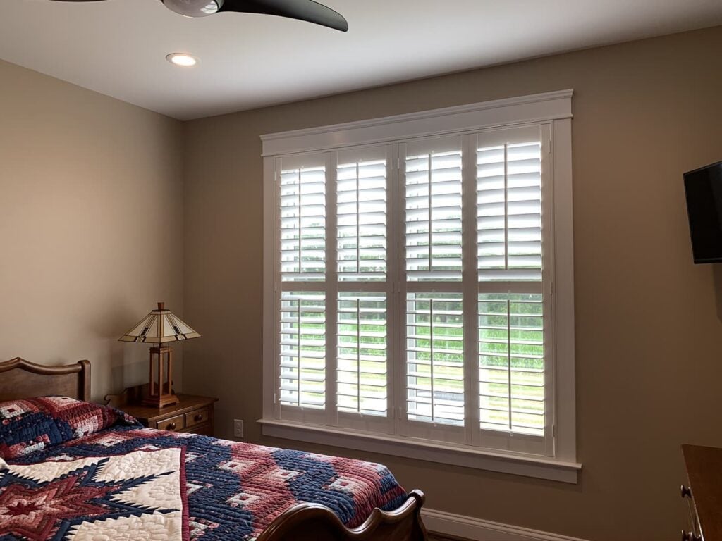 interior shutters with divider rail and 3 1/2" louvers