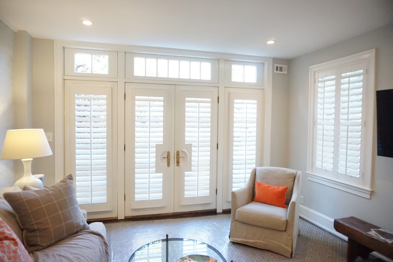 interior shutters on French doors in a living room