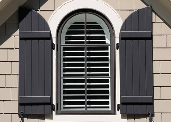 rounded-top board and batten exterior shutters