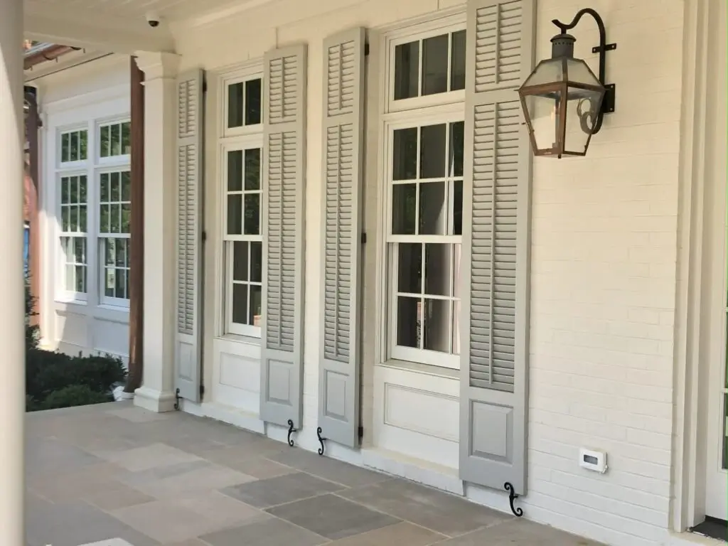combination louvered and paneled exterior shutters