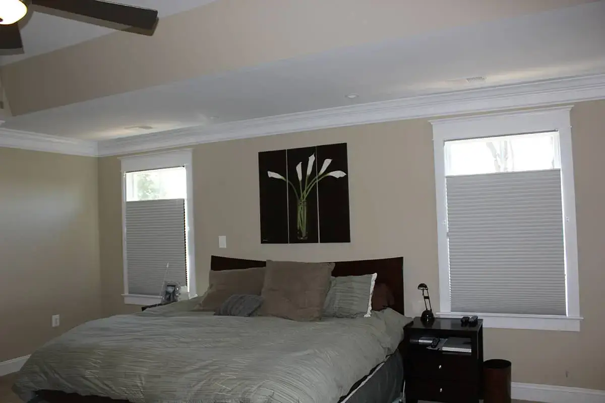 top-down / bottom-up honeycomb shades in a master bedroom